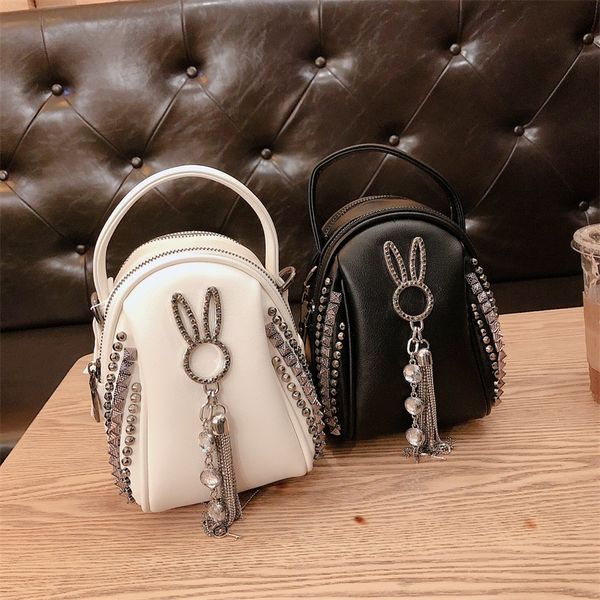 mobile phone bag women's messenger vertical rhinestone chain mini bags summer fashion tassel small girl
mobile phone bag women's messenger vertical rhinestone chain mini bags summer fashion tassel small girl