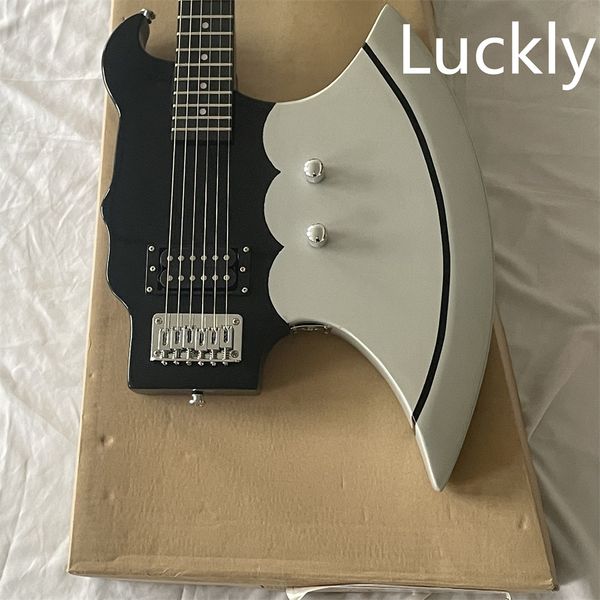 in stock special-shaped 24-piece electric guitar axe body with double open pickup strings behind wear customizable guitars guitarra
in stock special-shaped 24-piece electric guitar axe body with double open pickup strings behind wear customizable guitars guitarra