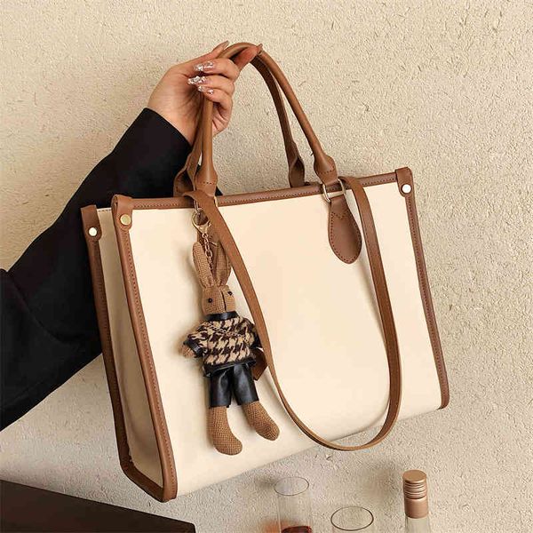 designer handbags handbag female large capacity hand carry to work mother high sense commuter minority design messenger single shoulder bag
designer handbags handbag female large capacity hand carry to work mother high sense commuter minority design messenger single shoulder bag