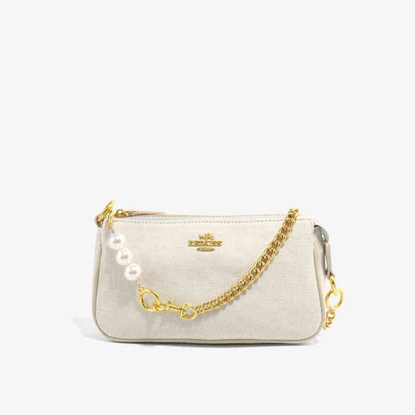 2022 spring street trend fashion elements denim white pearl chain hand-held small square bag2191-1
2022 spring street trend fashion elements denim white pearl chain hand-held small square bag2191-1