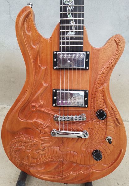 hand carved dragon pattern six string electric guitar our shop can customize various guitars
hand carved dragon pattern six string electric guitar our shop can customize various guitars