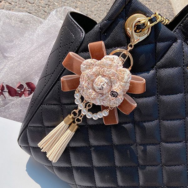women camellia keychain tassel flower key ring chains jewelry imitation pearl pendant keyrings car keys holder luxury fashion bag charm acce, Slivery;golden
women camellia keychain tassel flower key ring chains jewelry imitation pearl pendant keyrings car keys holder luxury fashion bag charm acce, Slivery;golden