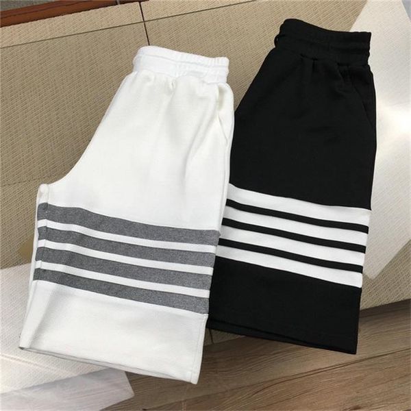 european station summer shorts men 2022 new trend print thin casual sports pants men's beach quick dry pants, White;black
european station summer shorts men 2022 new trend print thin casual sports pants men's beach quick dry pants, White;black