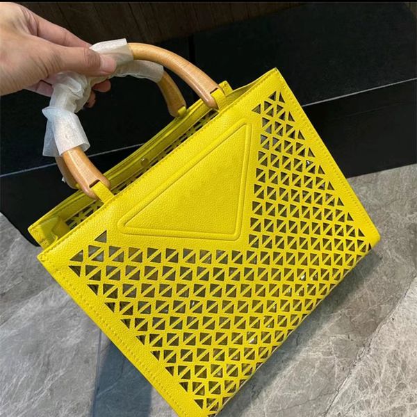 designer tote fashion beach bags luxury cutout totes wooden handle portable mommy shopping bag summer leather lady big handbags travel large
designer tote fashion beach bags luxury cutout totes wooden handle portable mommy shopping bag summer leather lady big handbags travel large