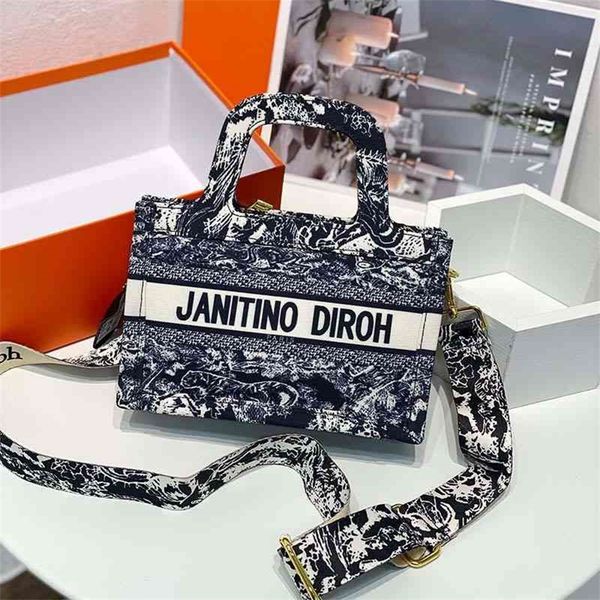 little tot classic print portable high-grade feeling single shoulder messenger wide shoulder strap counter same women's bag 75% purses
little tot classic print portable high-grade feeling single shoulder messenger wide shoulder strap counter same women's bag 75% purses