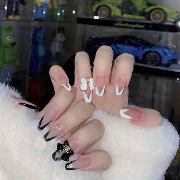 false nails 2022 new trend french simple long ballerina white bowknot fake full cover coffin 24pcs box with glue 0616
false nails 2022 new trend french simple long ballerina white bowknot fake full cover coffin 24pcs box with glue 0616