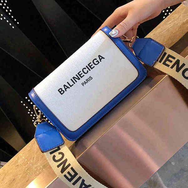 summer small bag women's fashion version versatile messenger wide shoulder strap one purse outlet 
summer small bag women's fashion version versatile messenger wide shoulder strap one purse outlet