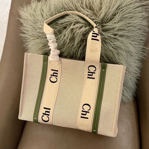 luxuries designers duffle large capacity totes bags shoulder bag women canvas woody tote handbags purses small medium large handbag 
luxuries designers duffle large capacity totes bags shoulder bag women canvas woody tote handbags purses small medium large handbag