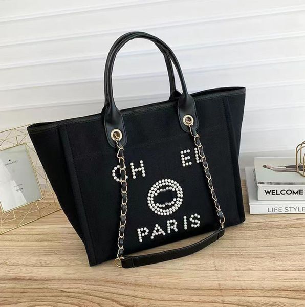 fashion classic luxury beach bags tote label pearl evening bag portable large capacity female designer canvas handbag brand ch women handbag
fashion classic luxury beach bags tote label pearl evening bag portable large capacity female designer canvas handbag brand ch women handbag