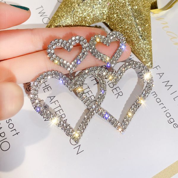 925 silver needle european and american fashion exaggerated diamond-embedded double love heart earrings temperament trend long peach heart e, Golden
925 silver needle european and american fashion exaggerated diamond-embedded double love heart earrings temperament trend long peach heart e, Golden