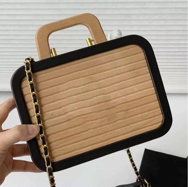 tz 2022 beech wooden box designer bags vanity cases quilted contrasting colors shoulder bag golden metal chain striped cross body handle han
tz 2022 beech wooden box designer bags vanity cases quilted contrasting colors shoulder bag golden metal chain striped cross body handle han