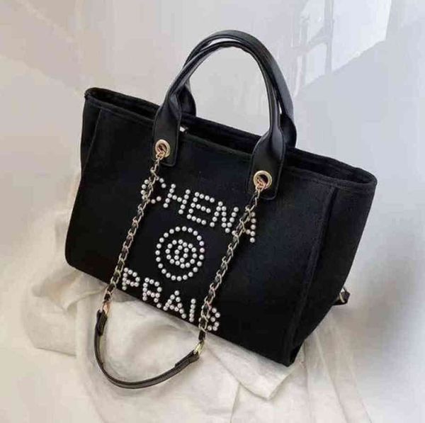 luxury fashion classic beach bags tote label pearl evening bag portable large capacity female designer canvas handbag brand women handbags l
luxury fashion classic beach bags tote label pearl evening bag portable large capacity female designer canvas handbag brand women handbags l