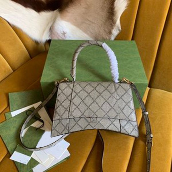 5a fashion designer ladies hourglass bag solid color leather one shoulder diagonal handbag
5a fashion designer ladies hourglass bag solid color leather one shoulder diagonal handbag