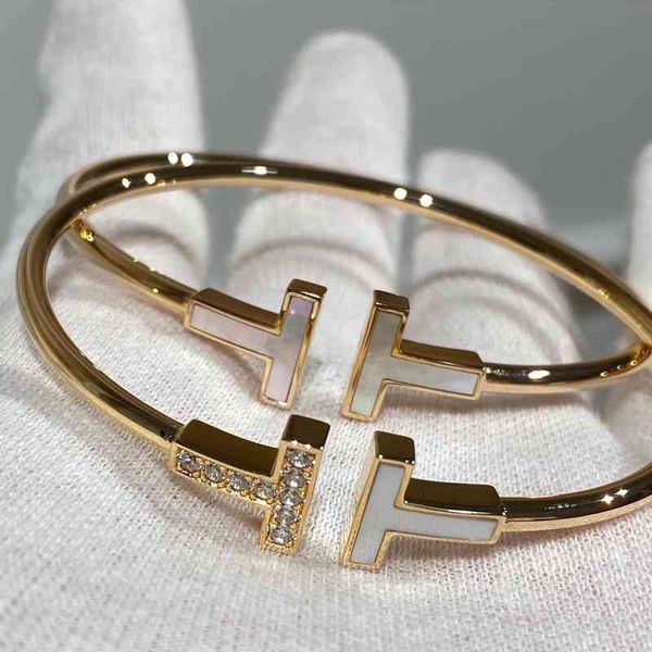 11lz t home double t bracelet 925 sterling silver plated 18k gold white fritillaria diamond inlaid t-shaped elastic bracelet female, Black
11lz t home double t bracelet 925 sterling silver plated 18k gold white fritillaria diamond inlaid t-shaped elastic bracelet female, Black