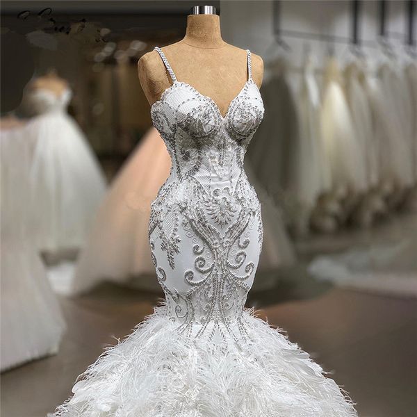 luxury mermaid wedding dress sleeveless v neck spaghetti straps appliques sequins lace floor length feather train illusion custom made ruffl, White
luxury mermaid wedding dress sleeveless v neck spaghetti straps appliques sequins lace floor length feather train illusion custom made ruffl, White