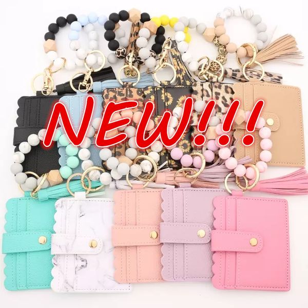 new fashion pu leather bracelet wallet keychain party favor tassels bangle key ring holder card bag silicone beaded wristlet keychains handb
new fashion pu leather bracelet wallet keychain party favor tassels bangle key ring holder card bag silicone beaded wristlet keychains handb