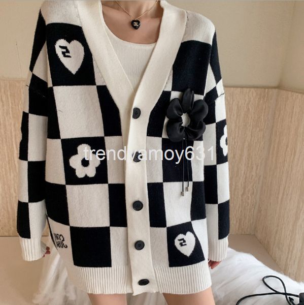 women's sweaters autumn and winter drawstring flower checkerboard v-neck cardigan loose jacquard knitted long sleeve jacket, White;black
women's sweaters autumn and winter drawstring flower checkerboard v-neck cardigan loose jacquard knitted long sleeve jacket, White;black