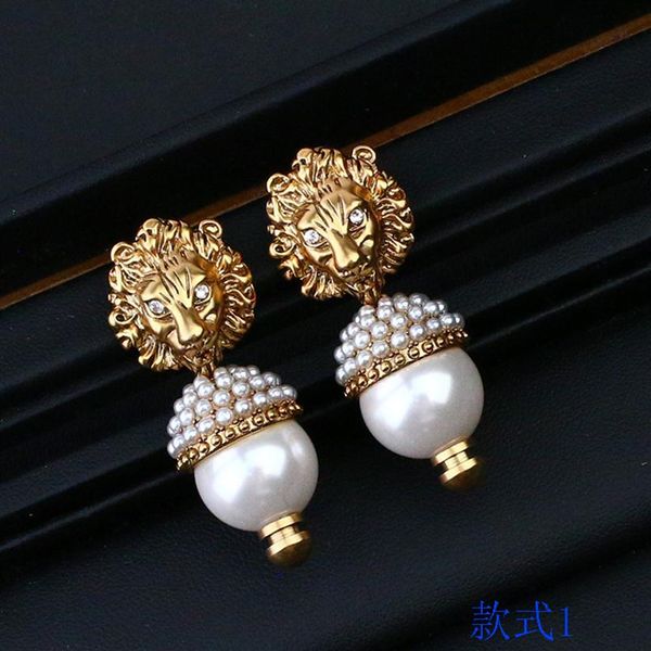 luxury jewelry family new fashion color diamond earrings lion head pearl net red same double earrings female283t, Golden
luxury jewelry family new fashion color diamond earrings lion head pearl net red same double earrings female283t, Golden