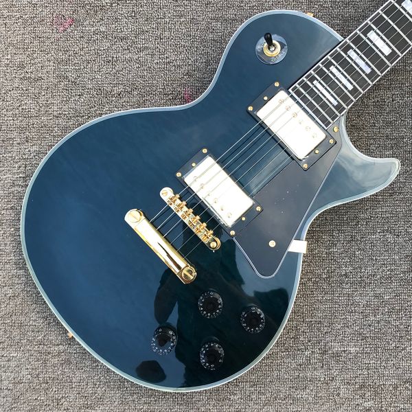 custom lp electric guitar, gold hardware, rosewood fingerboard, transparent black burst color quilte maple, 2 pickups, solid mahogany body g
custom lp electric guitar, gold hardware, rosewood fingerboard, transparent black burst color quilte maple, 2 pickups, solid mahogany body g