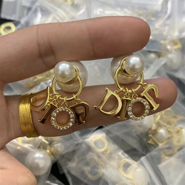 circle letter tassel pearl earrings female high sense hollow out earrings, Golden
circle letter tassel pearl earrings female high sense hollow out earrings, Golden