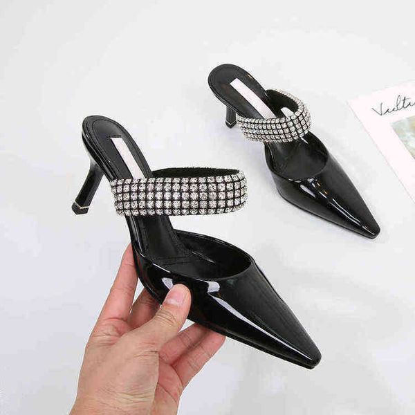 king rhinestone 2022 high-heeled shoes with pointed thin heels and straight line sandals women's black wool slippers
king rhinestone 2022 high-heeled shoes with pointed thin heels and straight line sandals women's black wool slippers