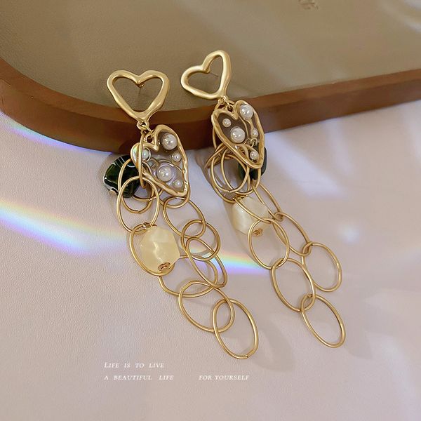 925 silver needle resin pearl heart-shaped tassel earrings long european and american personalized selling eardrops fashion design earri, Golden
925 silver needle resin pearl heart-shaped tassel earrings long european and american personalized selling eardrops fashion design earri, Golden