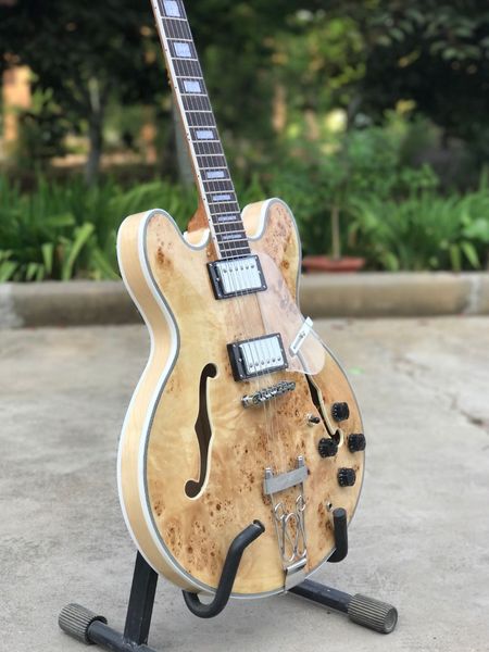 semi hollow body jazz electric guitar natural wood color gitaar costom 6 stings jazz guitarra vibrato system
semi hollow body jazz electric guitar natural wood color gitaar costom 6 stings jazz guitarra vibrato system