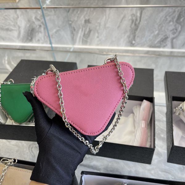 luxury designer fashion new triangle logo nimi one shoulder leather crossbody chain women bag 2022
luxury designer fashion new triangle logo nimi one shoulder leather crossbody chain women bag 2022