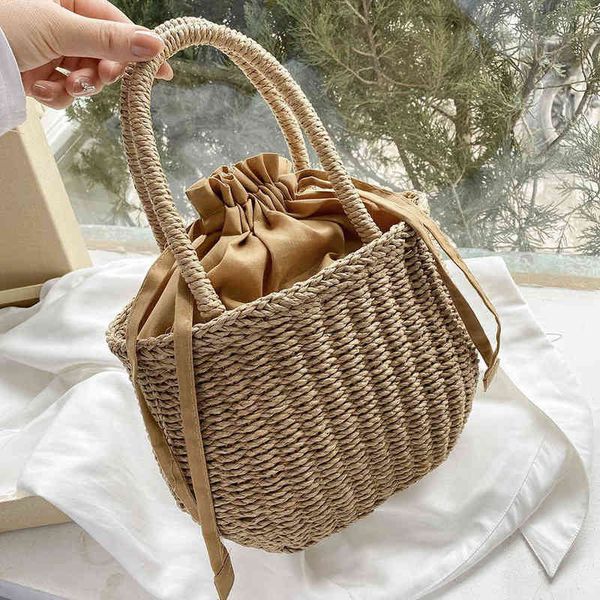 handle designer straw bag for women 2021 brand simple luxury summer handbags female travel small drawstring bucket bag totes g220429
handle designer straw bag for women 2021 brand simple luxury summer handbags female travel small drawstring bucket bag totes g220429