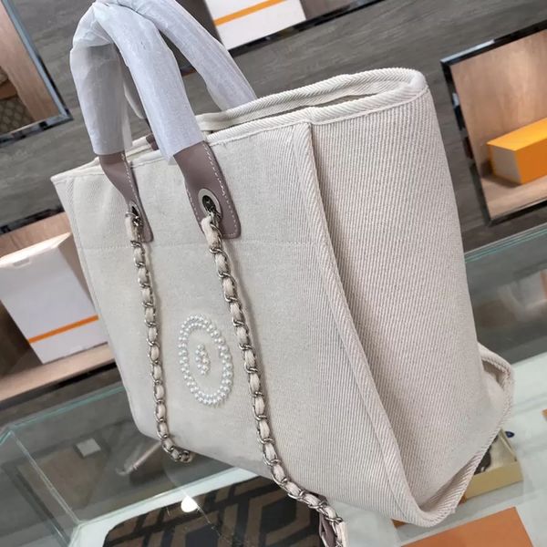 women canvas tote bag luxury designer chain handbags large capacity vintage shoulder bag with flower laser female travel casual shopping bag
women canvas tote bag luxury designer chain handbags large capacity vintage shoulder bag with flower laser female travel casual shopping bag