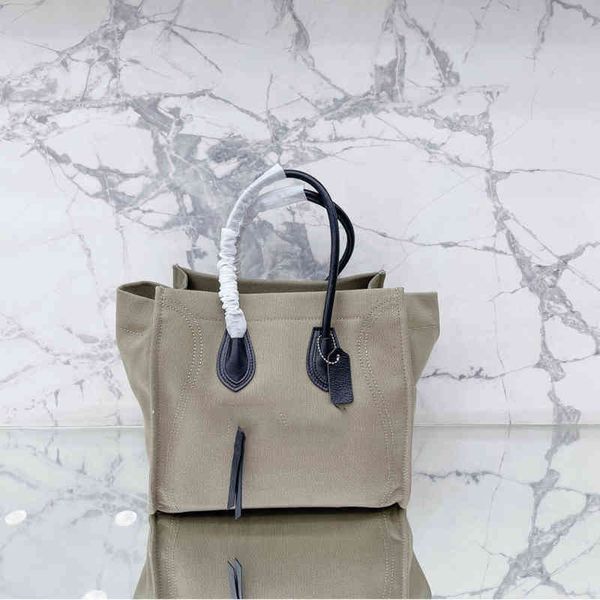 classic designer handbag tote bag women canvas smile handbags leather shoulder bags purse lady shopping purse 220719
classic designer handbag tote bag women canvas smile handbags leather shoulder bags purse lady shopping purse 220719