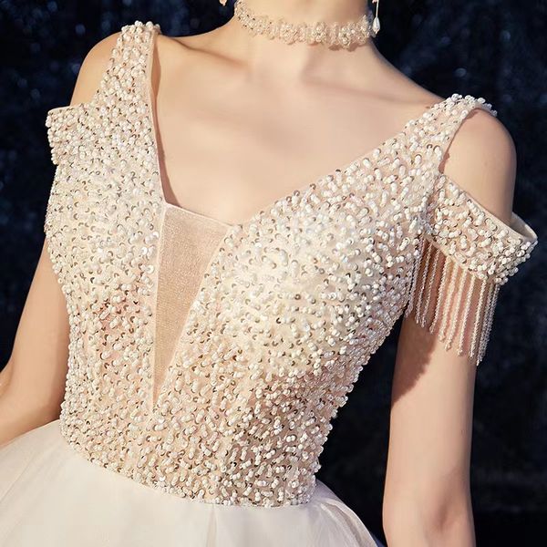 new v-neck wedding dress 2022 bride gown one shulder large trailing mori super fairy simple starry sky french main bridal gowns, White
new v-neck wedding dress 2022 bride gown one shulder large trailing mori super fairy simple starry sky french main bridal gowns, White
