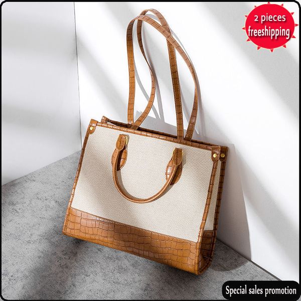 factory online export designer brand bag handbag and new large capacity tote female contrast canvas computer
factory online export designer brand bag handbag and new large capacity tote female contrast canvas computer