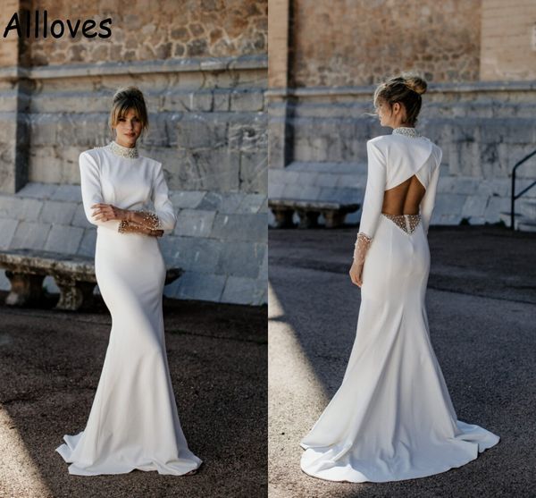 pearls high collar mermaid wedding gowns with long sleeves modest satin arabic dubai bridal dress hollow backless fashion brides robes de ma, White
pearls high collar mermaid wedding gowns with long sleeves modest satin arabic dubai bridal dress hollow backless fashion brides robes de ma, White