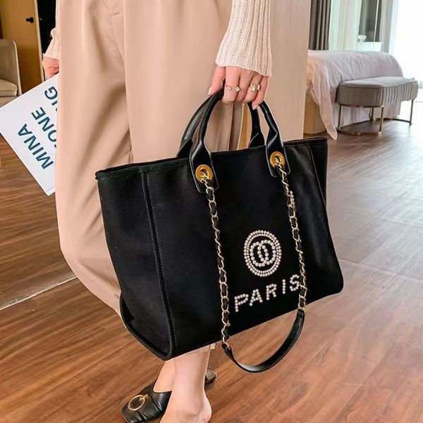 classic women canvas evening bags fashion label pearl beach bag brand ch designers portable large capacity female handbag luxury big handbag
classic women canvas evening bags fashion label pearl beach bag brand ch designers portable large capacity female handbag luxury big handbag