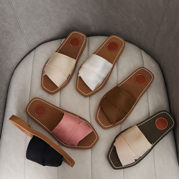 summer fashion sandal for woman designer sliders fashion women slides woody sandals letter solid flat heel slippers casual shoe beach flip f, Black
summer fashion sandal for woman designer sliders fashion women slides woody sandals letter solid flat heel slippers casual shoe beach flip f, Black