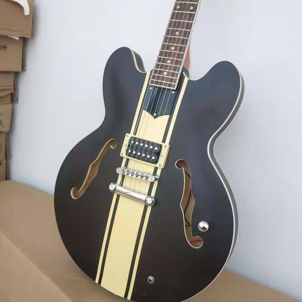 grot - coffee maple electric guitar, hollow body, double hole f, thin body, pale tuning fork
grot - coffee maple electric guitar, hollow body, double hole f, thin body, pale tuning fork