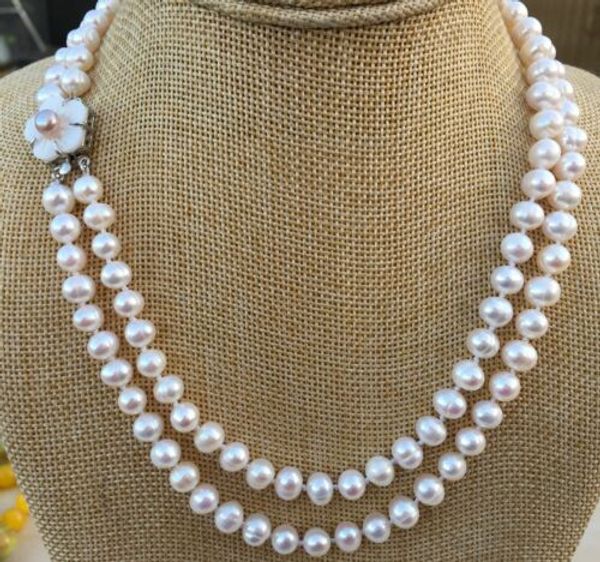 2row natural 7-8mm white freshwater pearl necklace 18-19 inch shell flower clasp, Silver
2row natural 7-8mm white freshwater pearl necklace 18-19 inch shell flower clasp, Silver