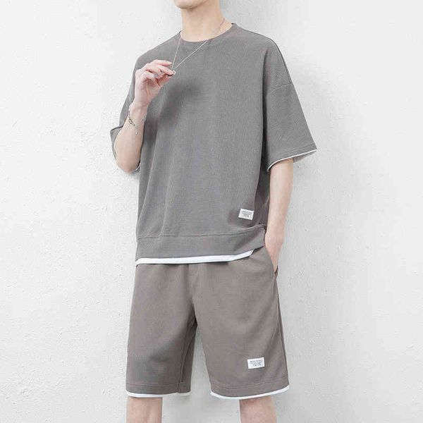 summer waffle ice silk short sleeve t-shirt men's sports leisure suit wear a set with handsome half solid color, White;black
summer waffle ice silk short sleeve t-shirt men's sports leisure suit wear a set with handsome half solid color, White;black