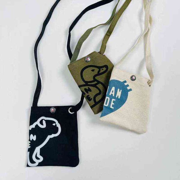 love dog duck print human made messenger bag harajuku style couple cute canvas shoulder bag outdoor mobile phone bag t220803
love dog duck print human made messenger bag harajuku style couple cute canvas shoulder bag outdoor mobile phone bag t220803