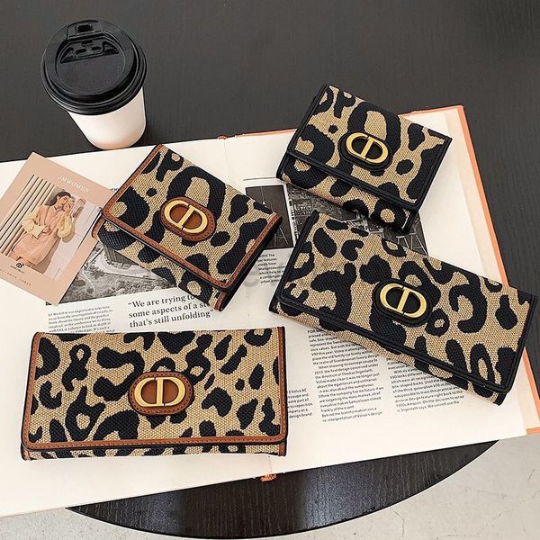 designer cd wallet card mens autumn winter new women's leather long three fold wallet hand bag large capacity leopard print fashion ret, Red;black
designer cd wallet card mens autumn winter new women's leather long three fold wallet hand bag large capacity leopard print fashion ret, Red;black