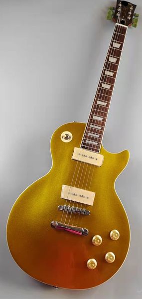 electric guitar, golden guitar, mahogany body, rosewood fingerboard, o matic bridge
electric guitar, golden guitar, mahogany body, rosewood fingerboard, o matic bridge