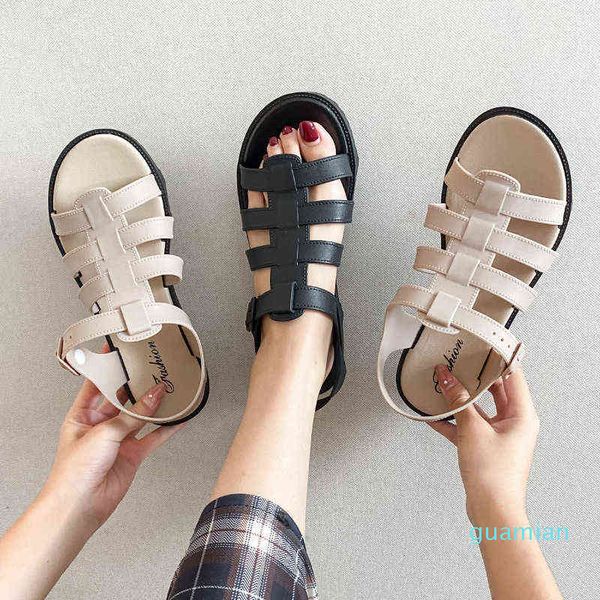 net red sandals lady summer new fairy style flat bottomed student fashion roman beach shoes ins wear out, Black
net red sandals lady summer new fairy style flat bottomed student fashion roman beach shoes ins wear out, Black