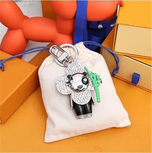 keychain classic luxury designers sun-flower key chain men car keyring women buckle keychains bags pendant ring gift with box and dustbag, Silver
keychain classic luxury designers sun-flower key chain men car keyring women buckle keychains bags pendant ring gift with box and dustbag, Silver