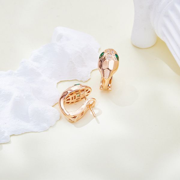 nothing2 bald snake stud earrings creative personality micro diamond green eye snake ear buckles holiday gift for girlfriend, Golden;silver
nothing2 bald snake stud earrings creative personality micro diamond green eye snake ear buckles holiday gift for girlfriend, Golden;silver
