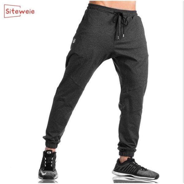 siteweie men's sports pants stretch slim pants cotton joggressportswear tracksuit bottoms skinny sweatpants gyms trousers lj201221, Black
siteweie men's sports pants stretch slim pants cotton joggressportswear tracksuit bottoms skinny sweatpants gyms trousers lj201221, Black