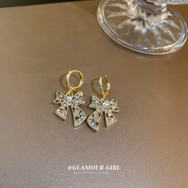 pearl diamond bow earrings korean fashion personal influencer temperament ear clip niche design all-match earrings, Golden
pearl diamond bow earrings korean fashion personal influencer temperament ear clip niche design all-match earrings, Golden