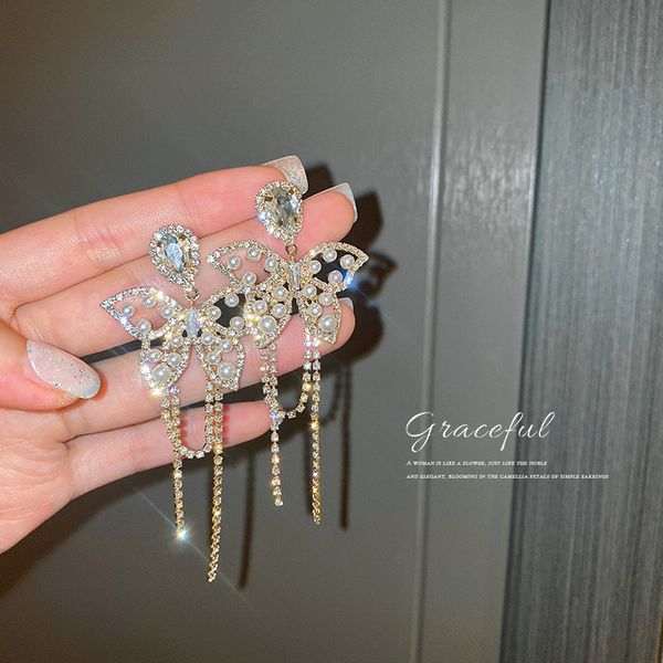 925 silver needle pearl diamond water drop butterfly earrings korean tassel long hollow earrings high-key dignified eardrop, Golden
925 silver needle pearl diamond water drop butterfly earrings korean tassel long hollow earrings high-key dignified eardrop, Golden
