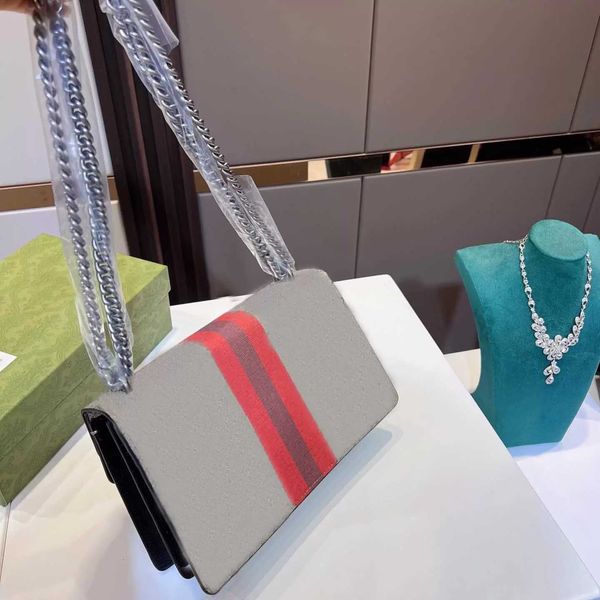 luxury designer chain armpit bag graffiti letter print pattern metal latch canvas urban handbag
luxury designer chain armpit bag graffiti letter print pattern metal latch canvas urban handbag