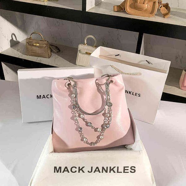 large capacity soft genuine leather pink tote bag portable chain pearl rhinestone handbag women single shoulder commuter 220516
large capacity soft genuine leather pink tote bag portable chain pearl rhinestone handbag women single shoulder commuter 220516